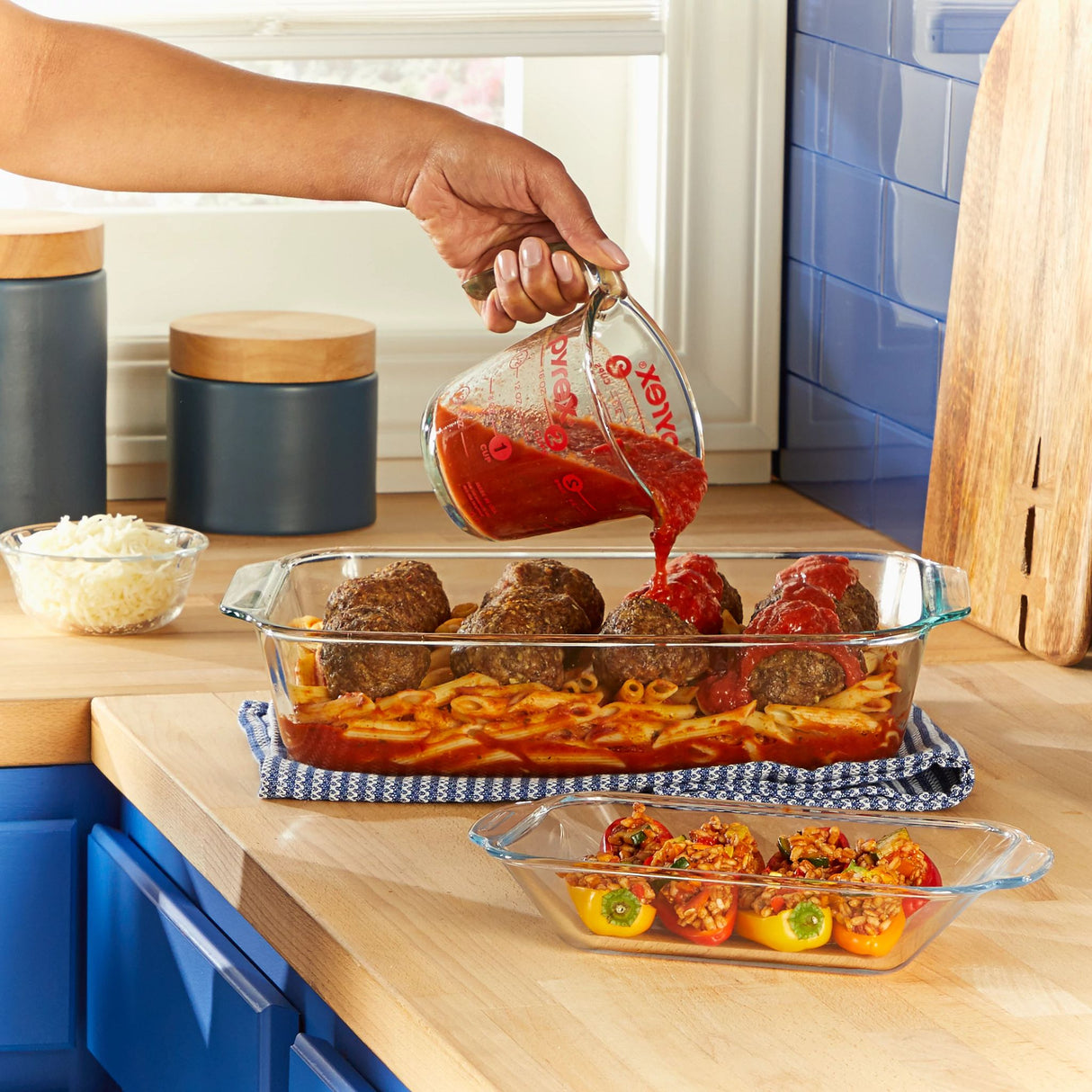 Pyrex Deep 9x13 on counter with meatballs and sauce