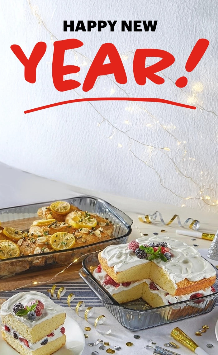 New Year's celebration with cake, cookies, and 'Happy New Year!' text on a white background.