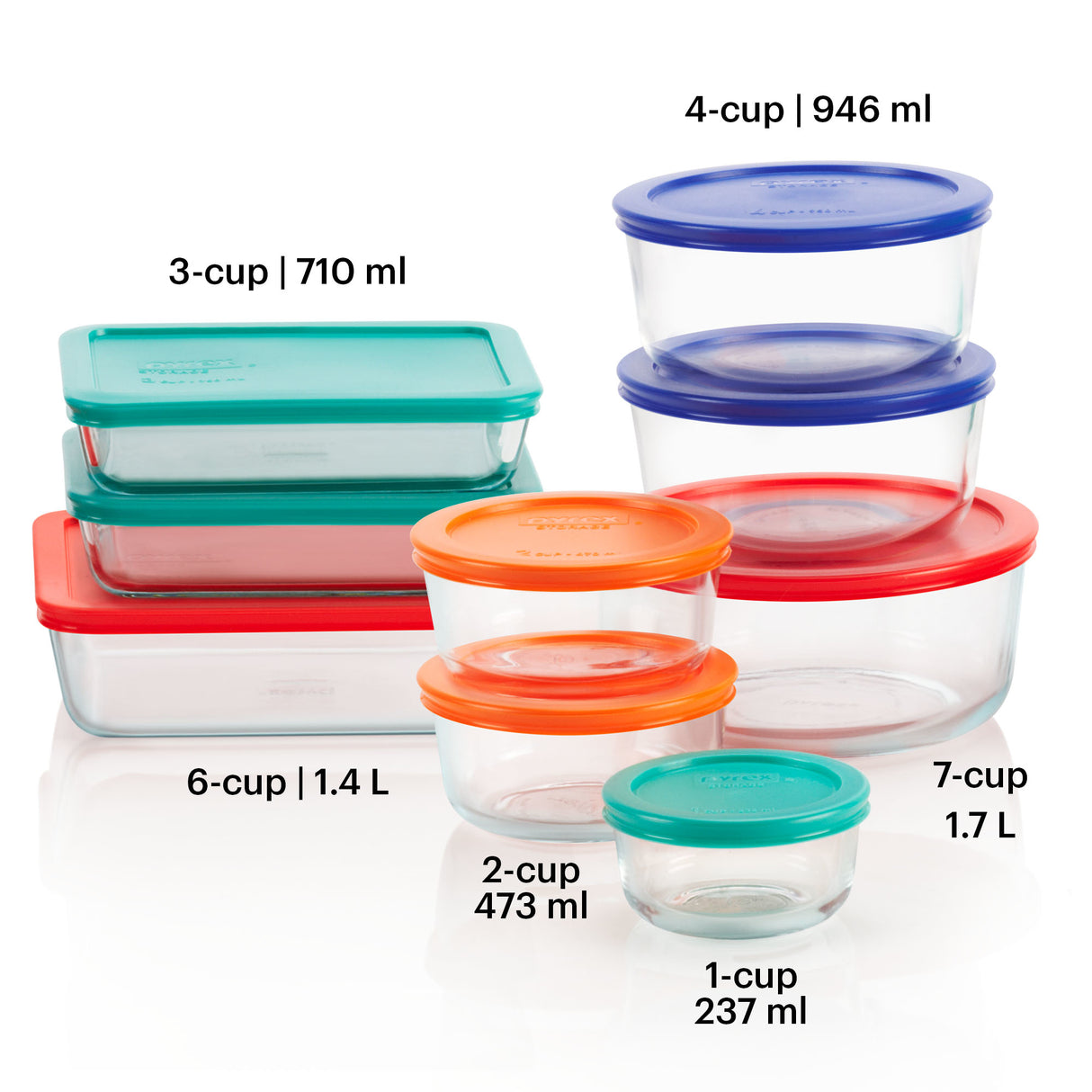 Set of glass food storage containers with colored lids on a white background