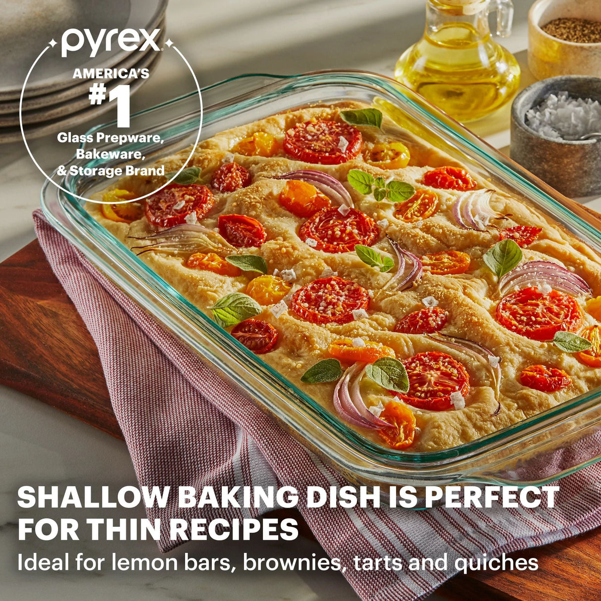 Shallow 9 x 13" Rectangular Glass Baking Dish with text shalloiw baking dish is perfect for thin recipes