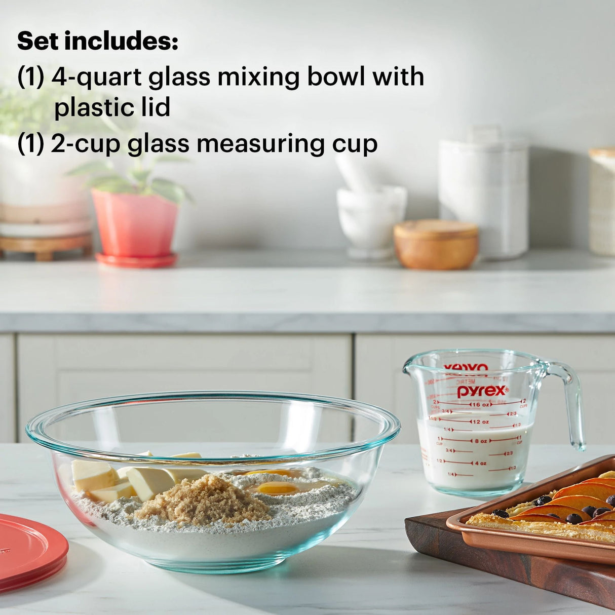 photo of prep set on the table with text one of each included 4-qt glass mixing bowl with lid & 2-cup glass measuring cup