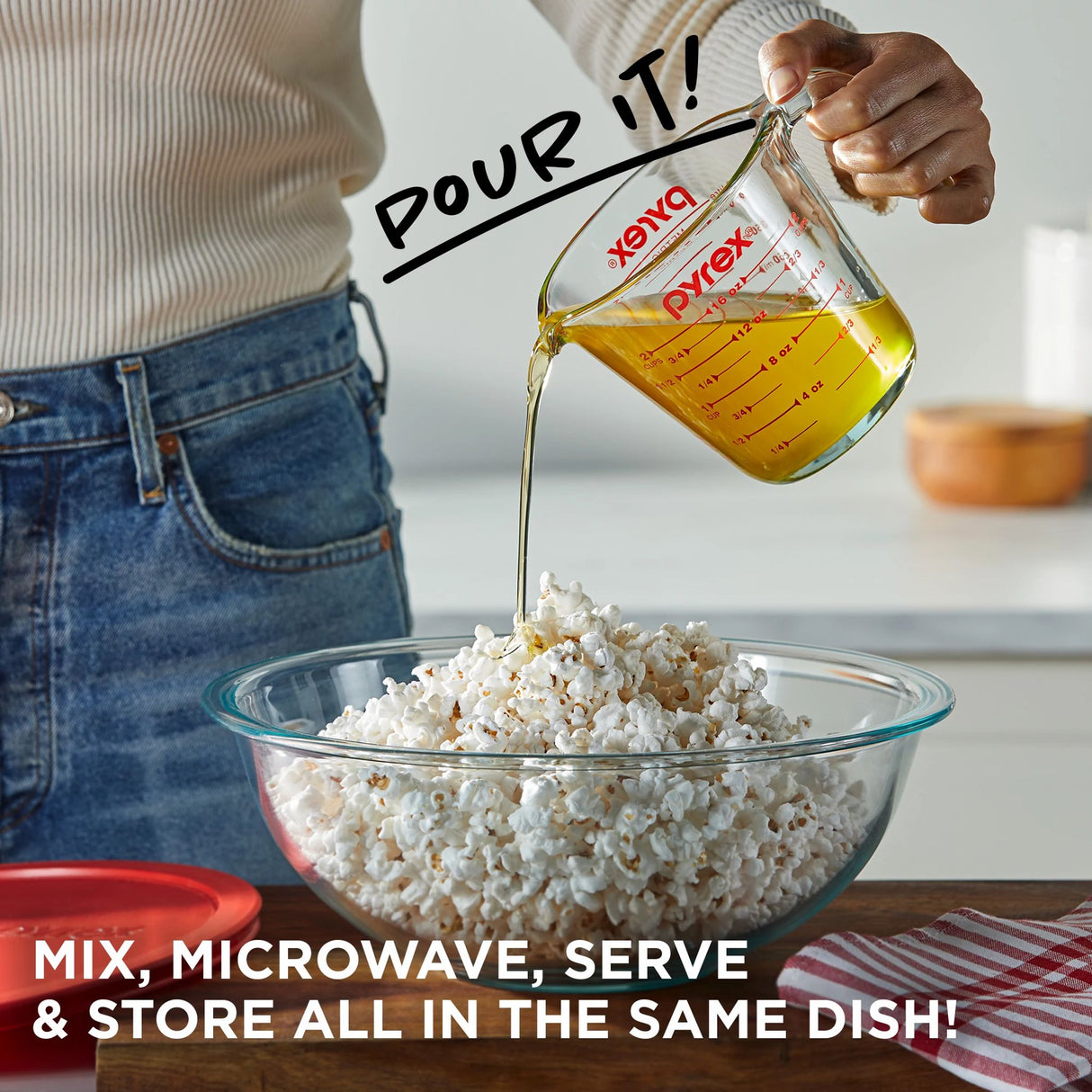 Glass Prep showng butter being poured from measuring cup over popcorn in bowl text mix,microwave & store in all the same dish