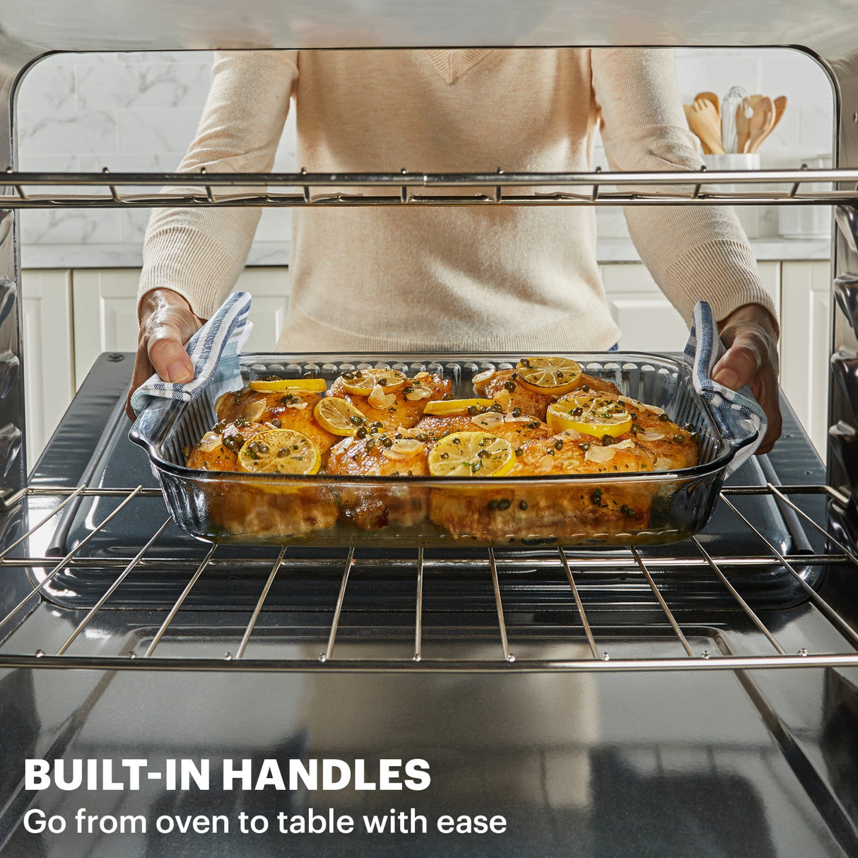 3-qt baking dish being put in oven with text built in handles go from oven to table with ease