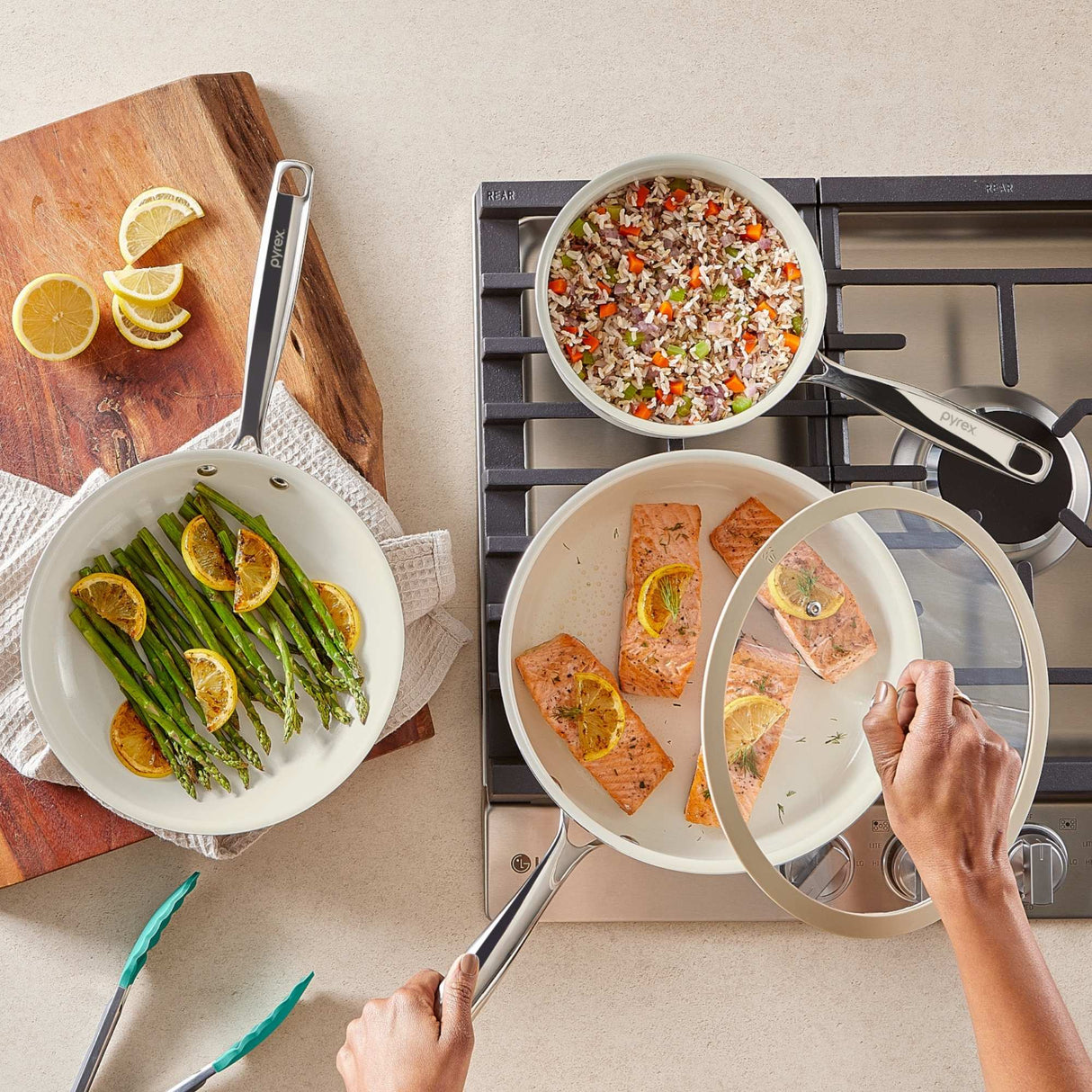 Cooking scene with various dishes on a stove and cutting board.