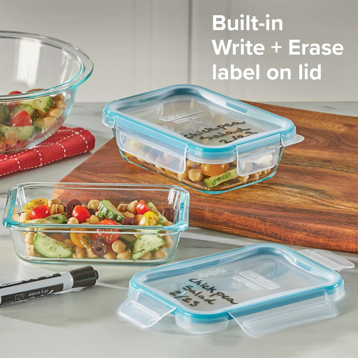 Total Solution Pyrex 4-pc Glass Storage Set on table with text on photo built in write & erase label on lid
