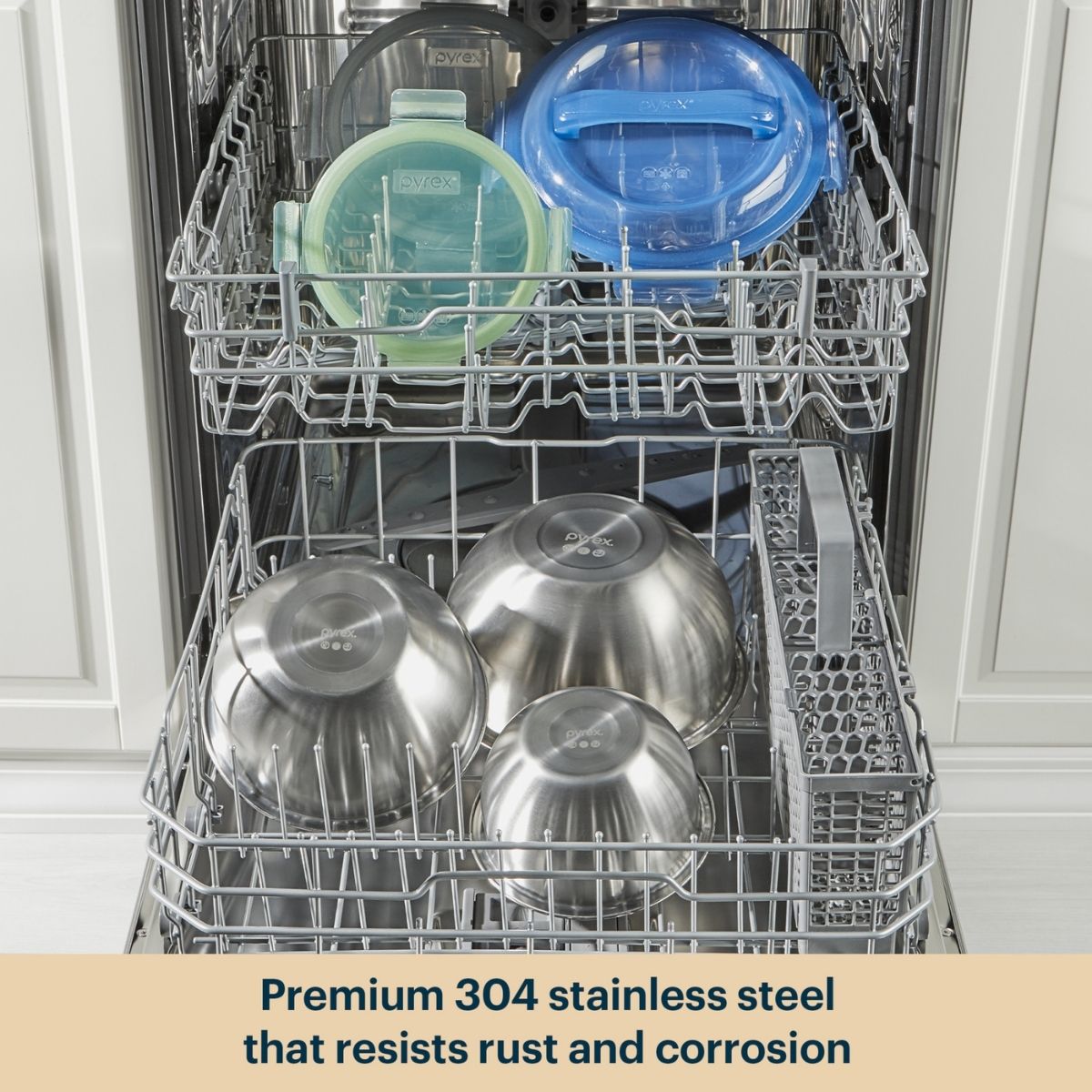 Dishwasher with stainless steel bowls and containers, highlighting durability.
