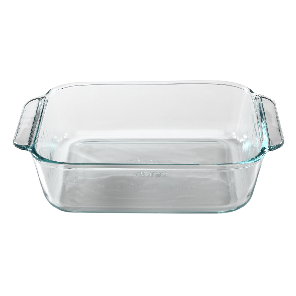 Clear glass baking dish with handles on a white background