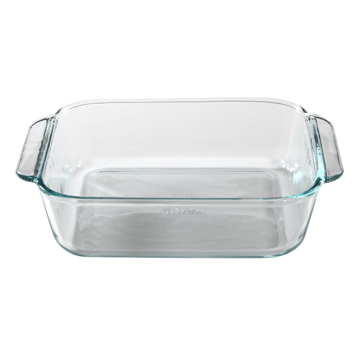 Clear glass baking dish with handles on a white background