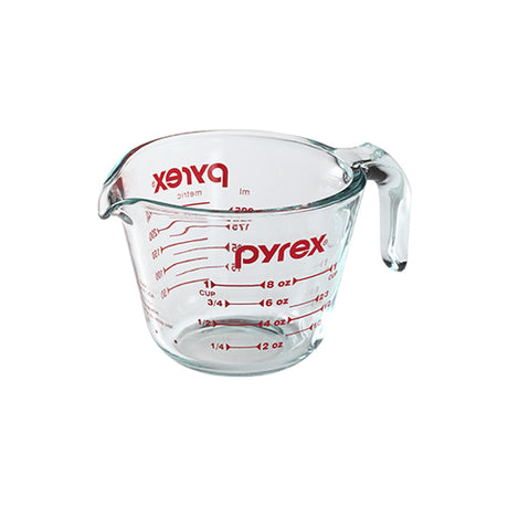 Pyrex measuring cup on a white background