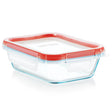 Rectangular glass food container with a red lid on a white background