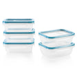 Set of clear food storage containers with blue lids on a white background