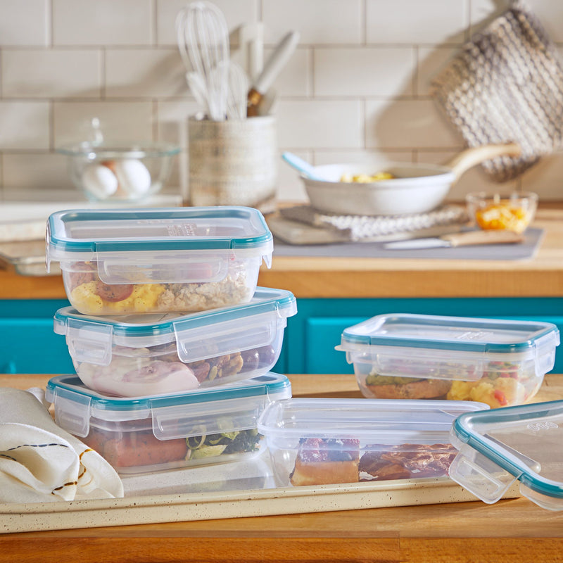  Total Solution™ 10-piece Rectangular Plastic Food Storage Set on counter with food