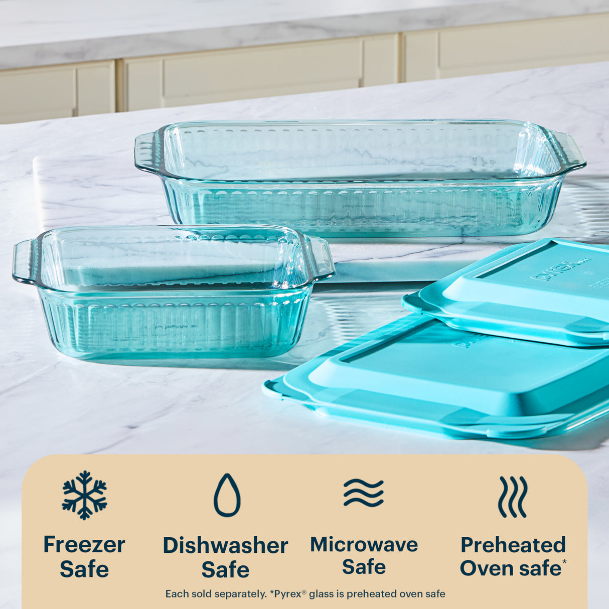 Set of glass bakeware with lids on a white surface, featuring Pyrex branding.