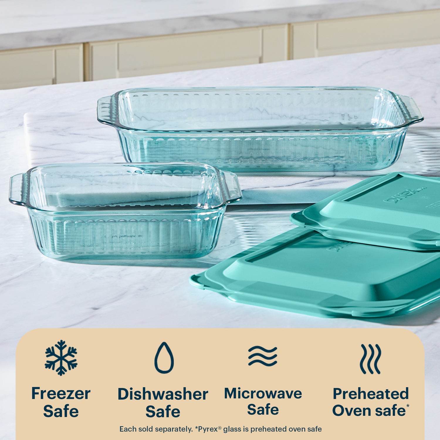 Set of glass bakeware with turquoise lids on a white surface, featuring safety icons and text.