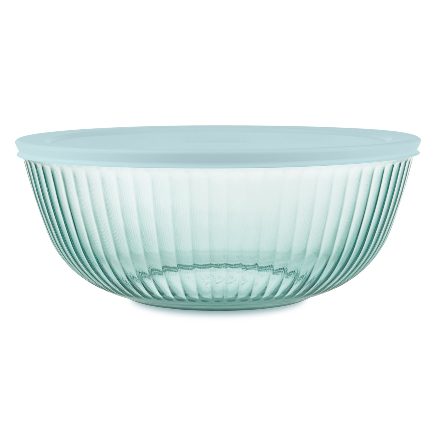 Light blue glass bowl with ribbed design on a white background