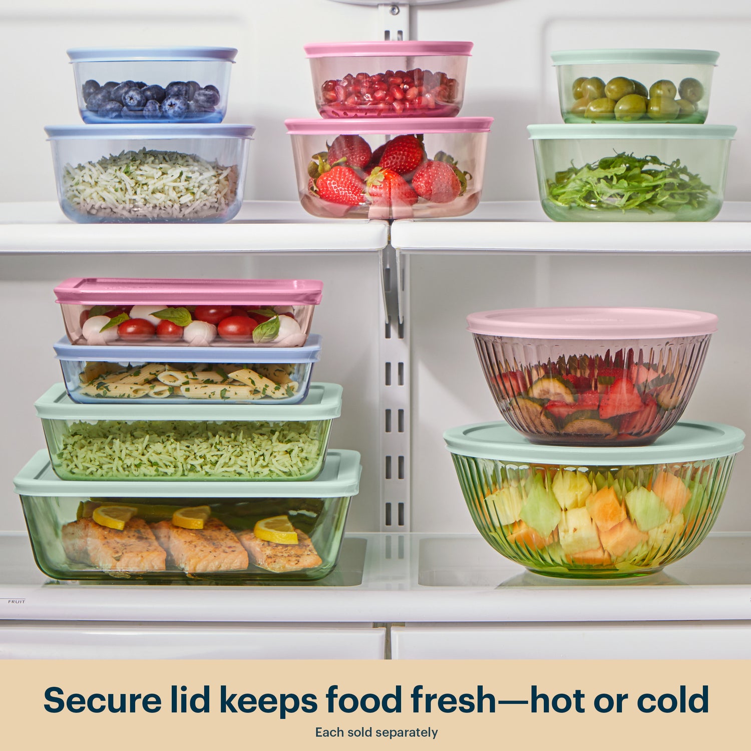 Colorful food storage containers with lids on a refrigerator shelf.