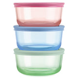 Three colorful plastic containers stacked on a white background