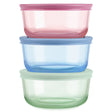 Three colorful food storage containers stacked on a white background