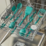 Teal kitchen utensils in a dishwasher rack