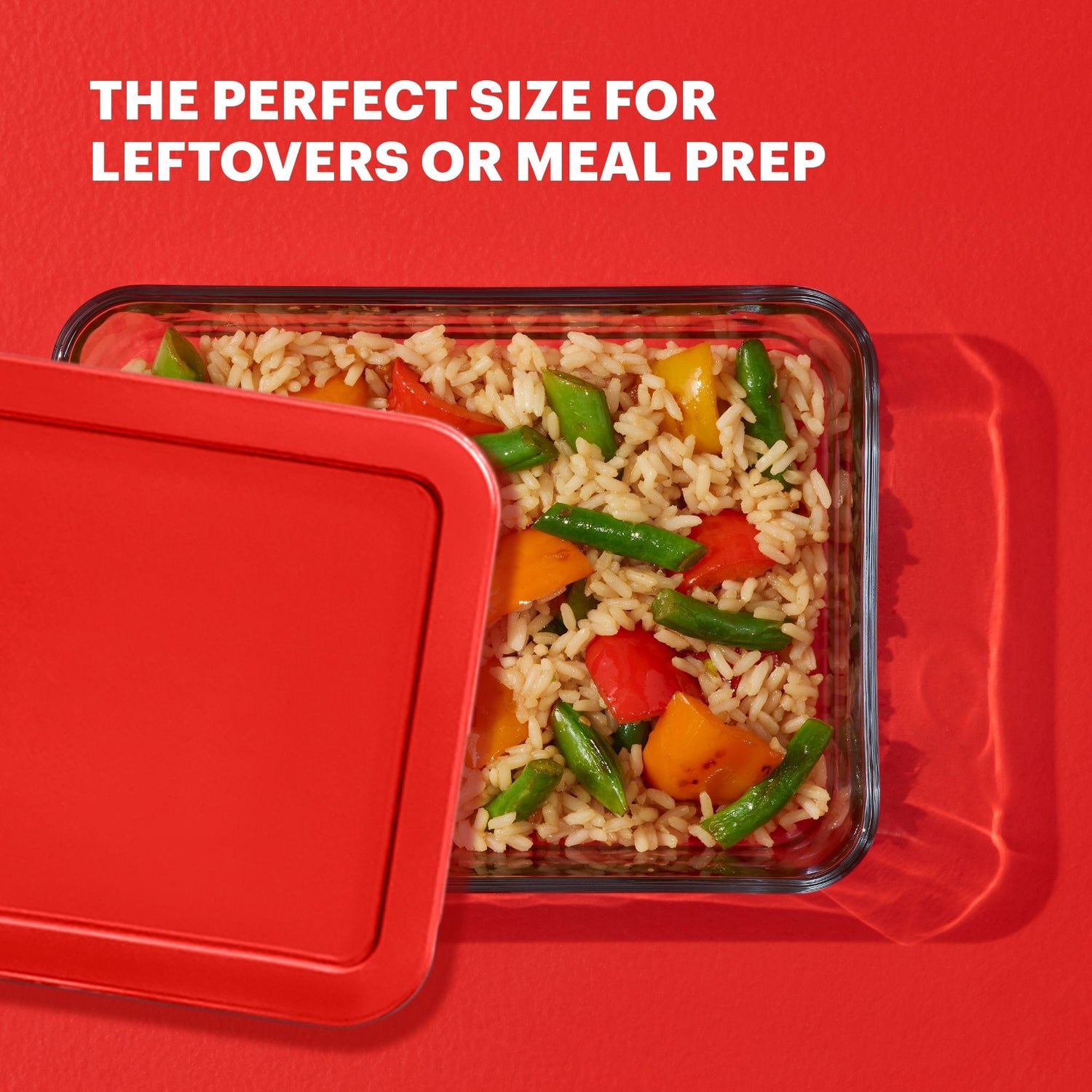 Glass food container with rice and vegetables on a red background, labeled 'The Perfect Size for Leftovers or Meal Prep'.