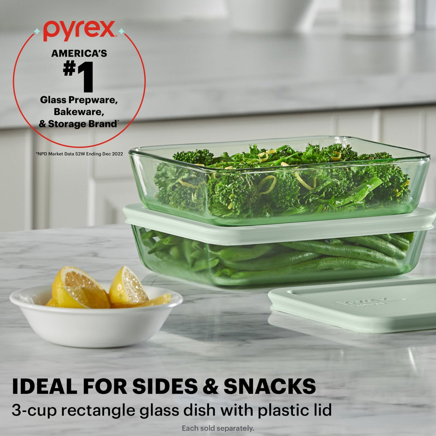 Pyrex Americas #1 Glass Prepware, Bakeware & Storage Brand, Simply Store® Tinted 3-cup Rectangle Storage with Green Plastic Lid with text Ideal for Sides and Snacks