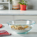 Mixing bowl with ingredients on marble table