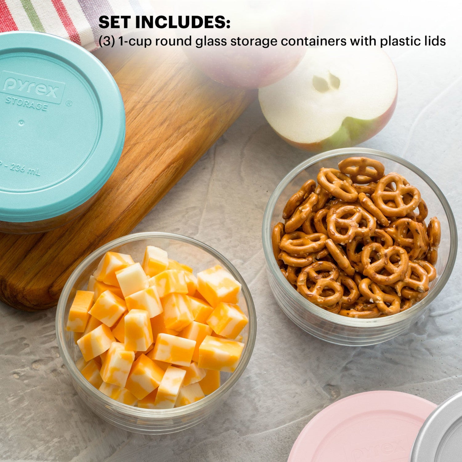 text: set includes three - 1 cup round glass storage containers with plastic lids