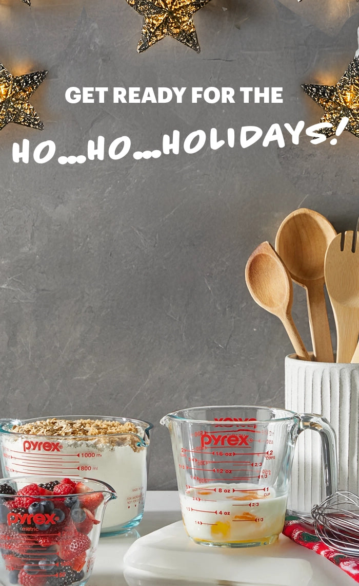 Pyrex measuring cups with ingredients on a kitchen counter, text 'Get ready for the ho...ho...holidays!' above.