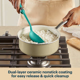 Person cooking rice in a pot with a green spoon on a stove, featuring dual-layer ceramic nonstick coating.