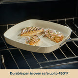 Pan with grilled chicken in an oven, text indicating oven safety.