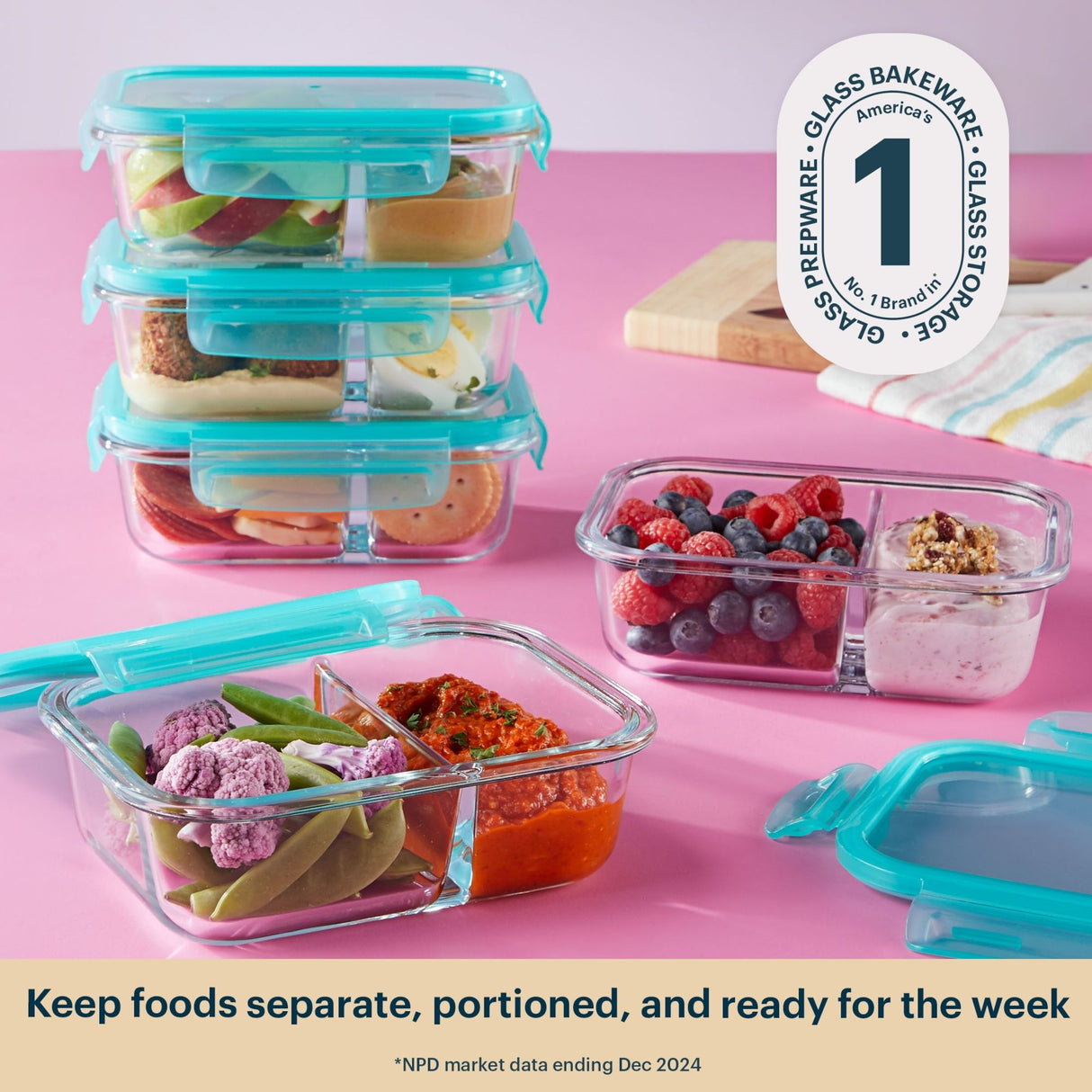 Glass food storage containers with colorful foods on a pink background, featuring the #1 brand in glass prepware and bakeware.