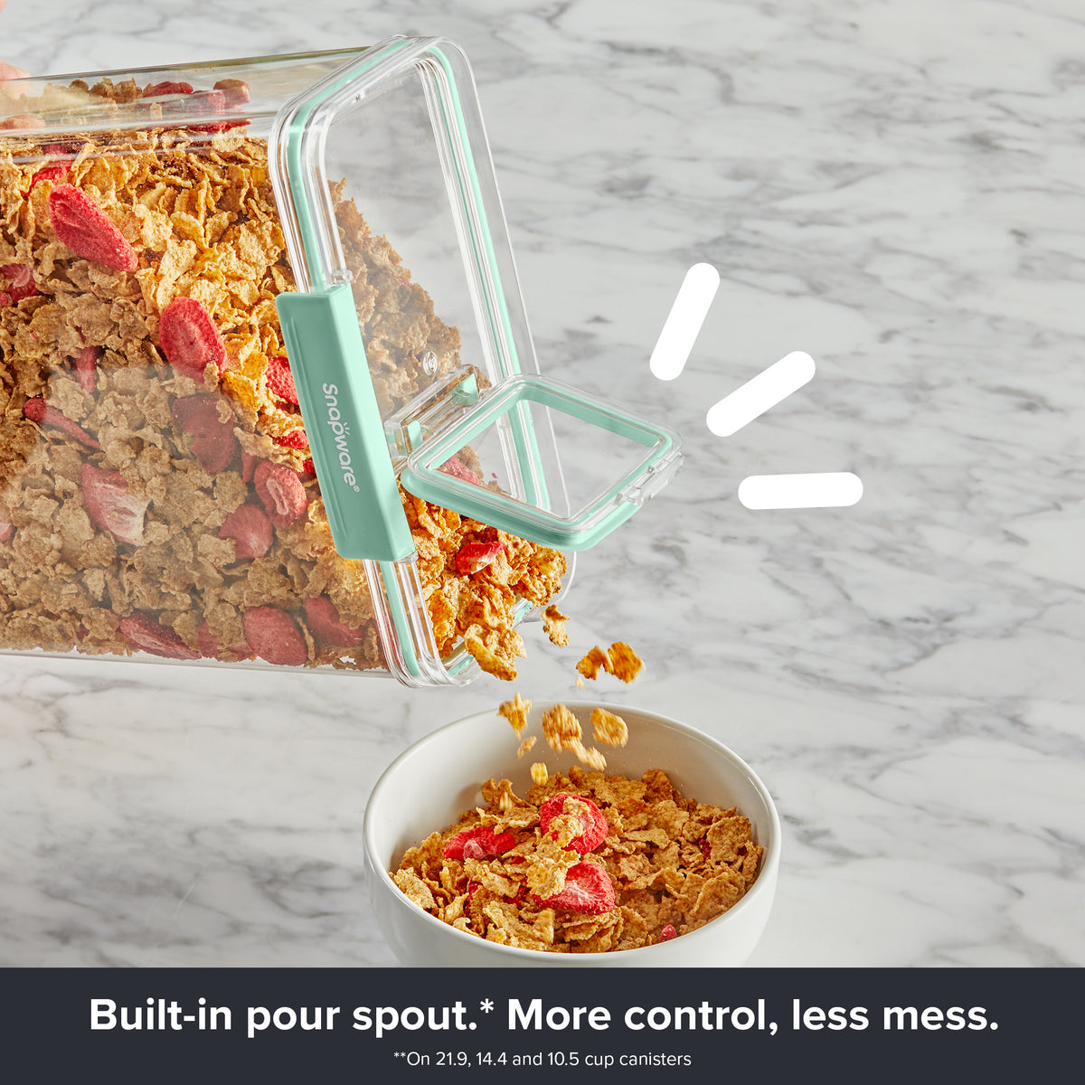 Close-up of a Snapware® food storage canister with an integrated pour spout, pouring cereal into a bowl for easy serving.