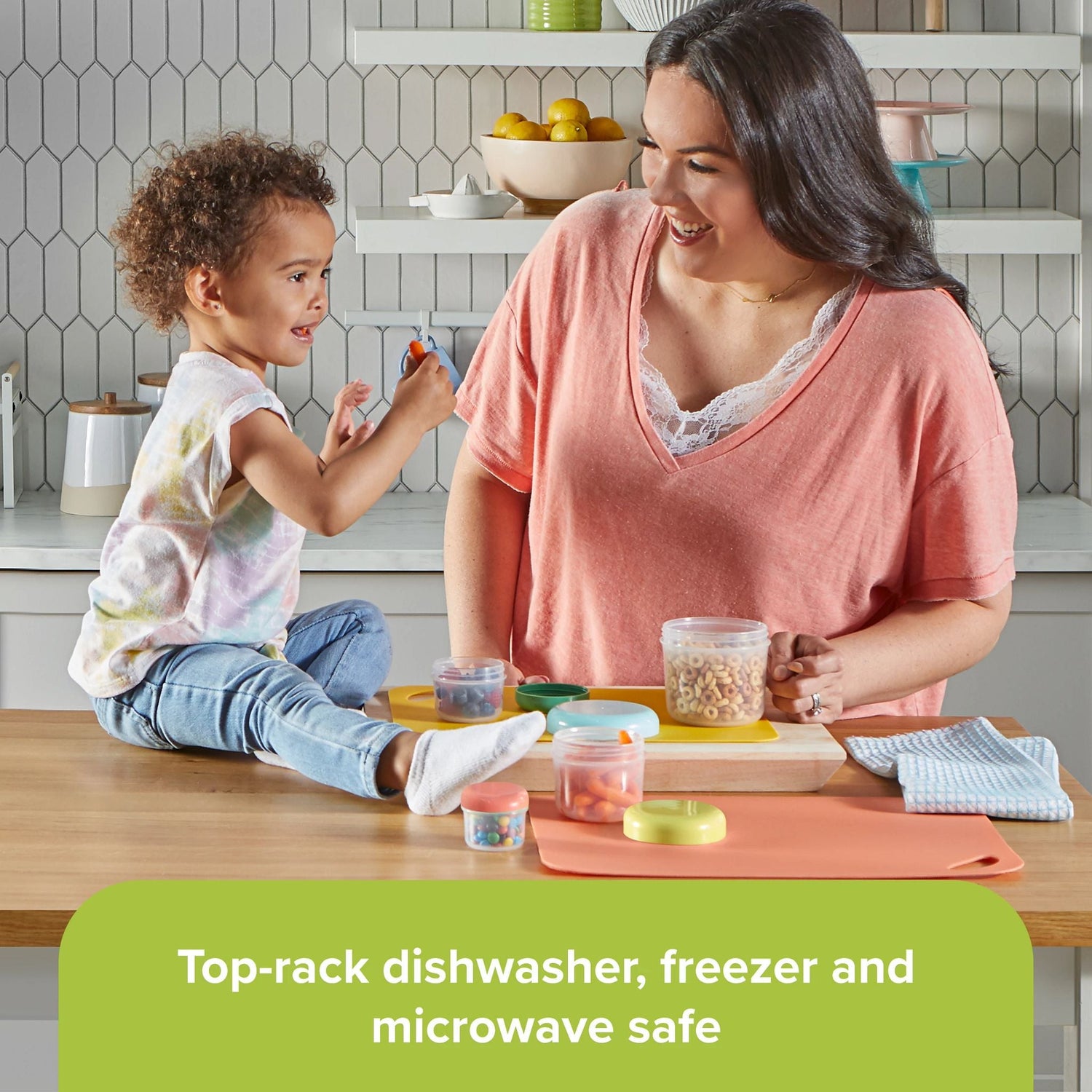  Meal Prep Mini 8-piece Plastic Storage Set with food inside being used by mom & little boy