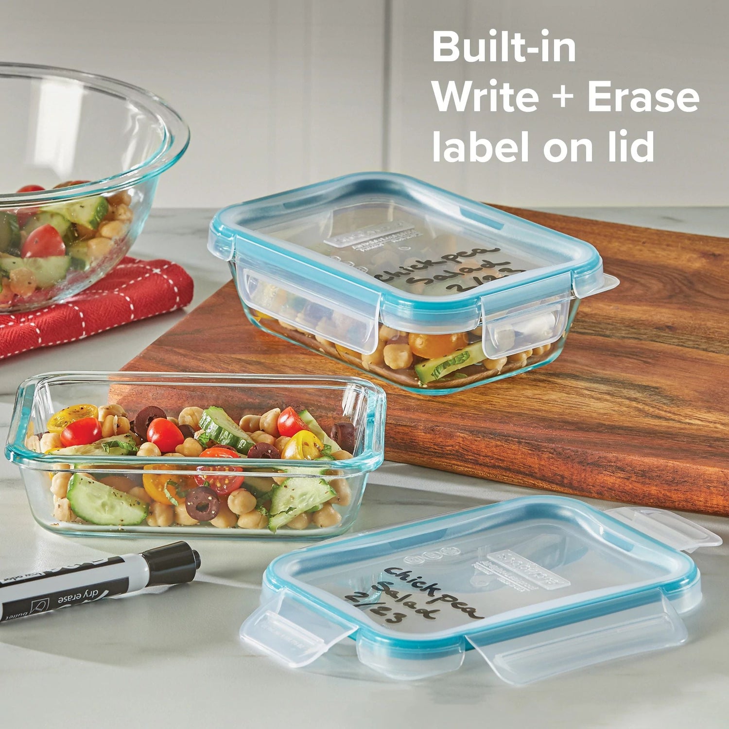  Total Solution Pyrex 4-pc Glass Storage Set on table with text on photo built in write & erase label on lid