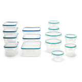 Set of clear food storage containers with blue lids on a white background
