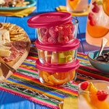 Pyrex glass set, vibrant food on a colorful tablecloth
