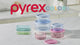 Video thumbnail: Pyrex COLORS glass food storage containers in blue, pink, and green on a kitchen counter.