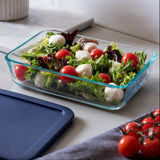 Glass container with salad on a kitchen counter