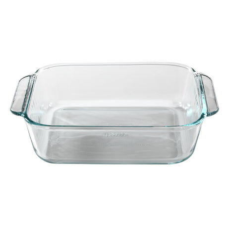 Clear glass baking dish with handles on a white background