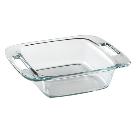 Clear glass baking dish with handles on a white background