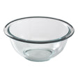 Clear glass mixing bowl on a white background