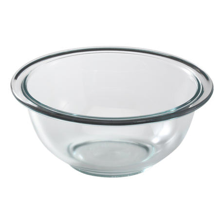 Clear glass mixing bowl on a white background