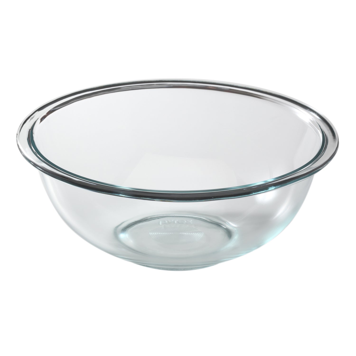 Clear glass mixing bowl on a white background