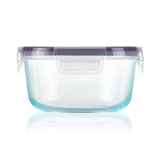 Clear plastic container with a purple lid on a white background