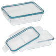 Two clear food storage containers with blue lids on a white background